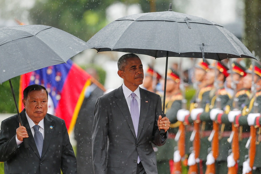 U.S. President Barack Obama (R) is welcome by Laos President Bounnhang Vorachith at the Presidential Palace in Vientiane, Laos September 6, 2016. REUTERS/Jorge Silva TPX IMAGES OF THE DAY