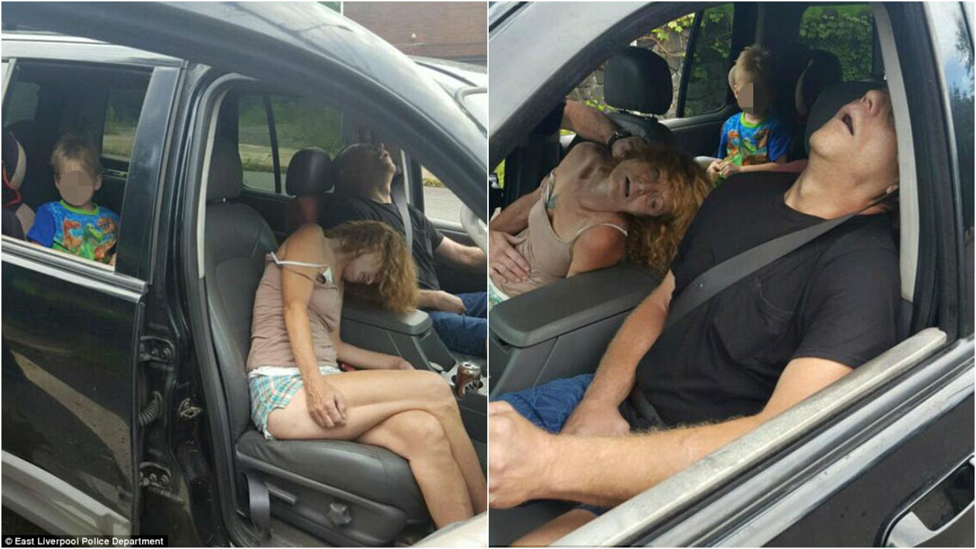 Police in East Liverpool, Ohio, shared on Facebook this shocking image showing Rhonda Pasek and James Acord passed out in their car with the woman's child in the backseat after a suspected heroin overdose.-pic via east liverpool police department- n