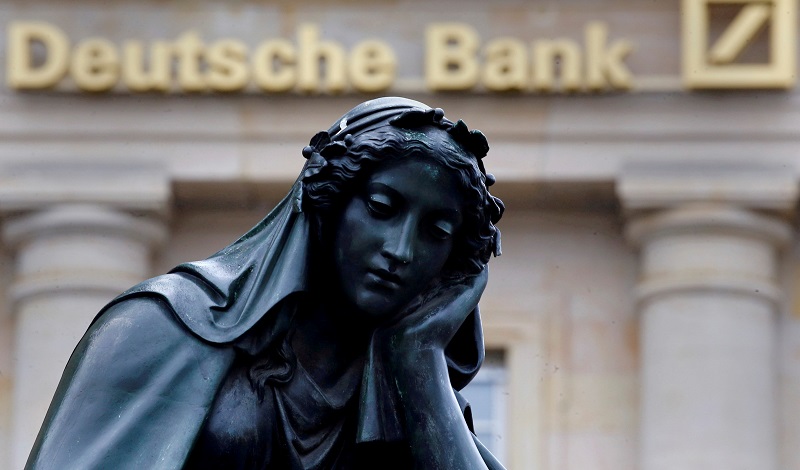 A statue is pictured next to the logo of Germanyu00e2u20acu2122s Deutsche Bank in Frankfurt, Germany, September 30, 2016. u00e2u20acu201d Reuters pic