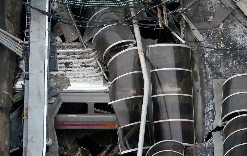 A train car is pictured in an aerial photo inside the New Jersey Transit Hoboken Terminal following a train crash in Hoboken, New Jersey, U.S. September 29, 2016. REUTERS/Carlo Allegri TPX IMAGES OF THE DAY