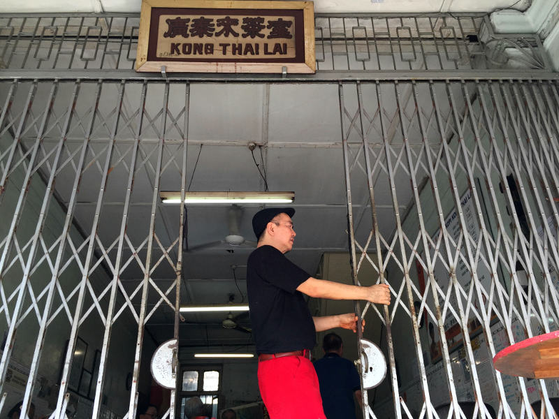 Calling it a day after 100 years...Gary Tan closing the Kong Thai Lai coffeeshop for the last time at Hutton Lane in George Town, Penang, September 26, 2016. u00e2u20acu201d Picture by KE Ooi