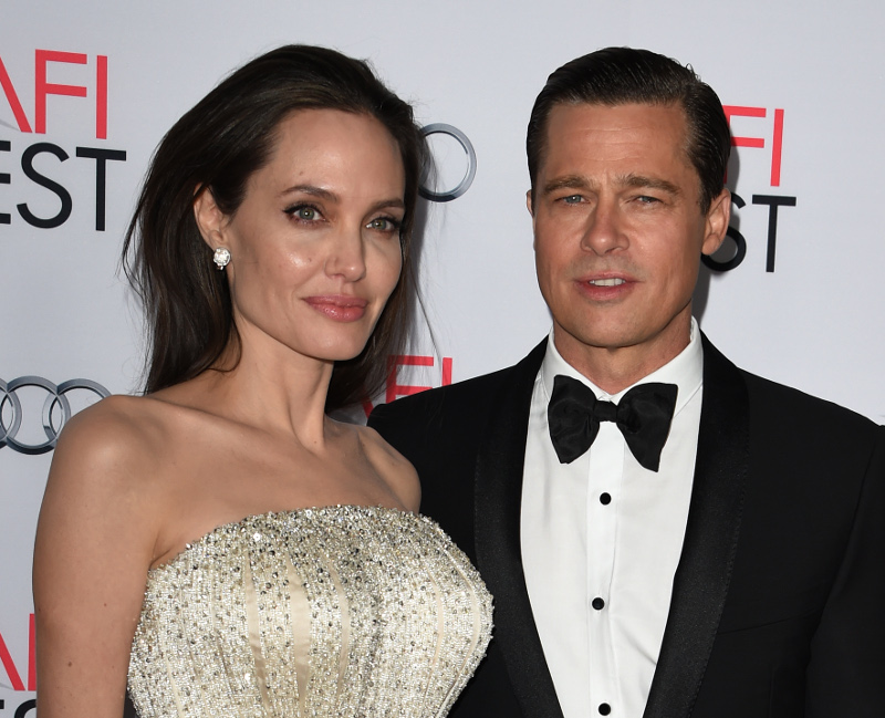 File picture taken on November 5, 2015 shows writer-director-producer-actress Angelina Jolie Pitt (left) and actor-producer Brad Pitt as they arrive for the opening night premiere of Universal Picturesu00e2u20acu2122 u00e2u20acu02dcBy the Seau00e2u20acu2122 in Hollywood. u00e2u20acu201d AFP pic