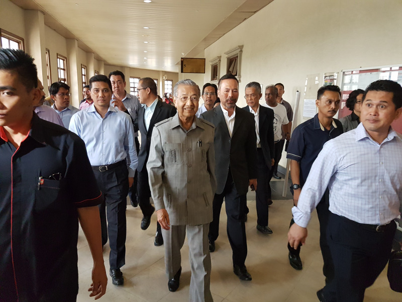 Tun Dr Mahathir Mohamad is seen leaving the court room where Datuk Seri Anwar Ibrahimu00e2u20acu2122s interim injunction to stop the NSC Act is being heard, September 5, 2016. u00e2u20acu201d Picture by Mayuri Mei Lin