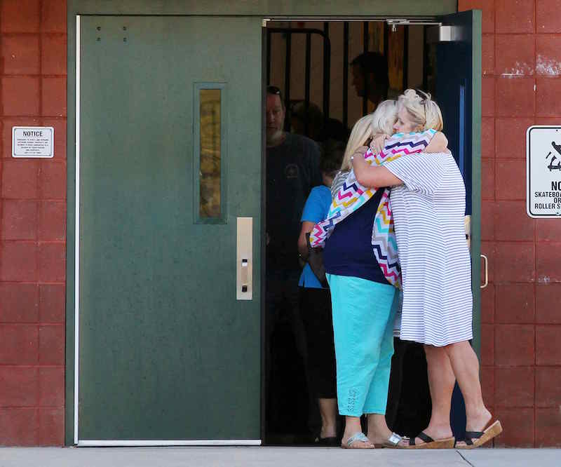 Two teachers hug outside of Townville Elementary School after a shooting in Townville, South Carolina, September 28, 2016. u00e2u20acu201d Reuters pic 