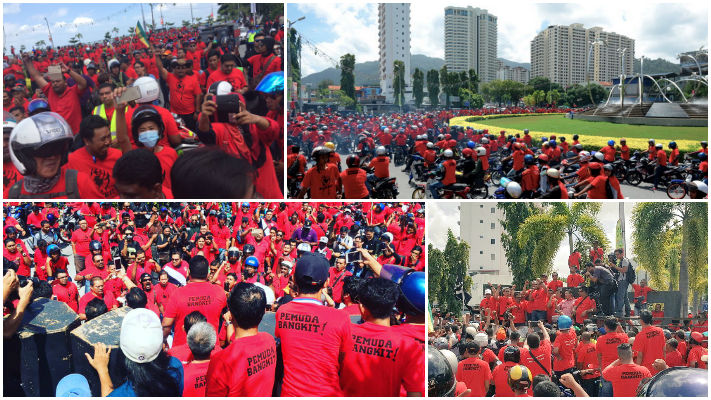u00e2u20acu00a8GEORGE TOWN, 1 Okt. -- Kira-kira 2,500 pemuda UMNO negeri yang memakai baju T berwarna merah membanjiri bulatan Persiaran Gurney untuk menjayakan Perhimpunan Bangkit Pulau Pinang 2016 hari ini.u00e2u20acu00a8Himpunan itu bagi meminta Ketua Menteri Lim Guan Eng mel