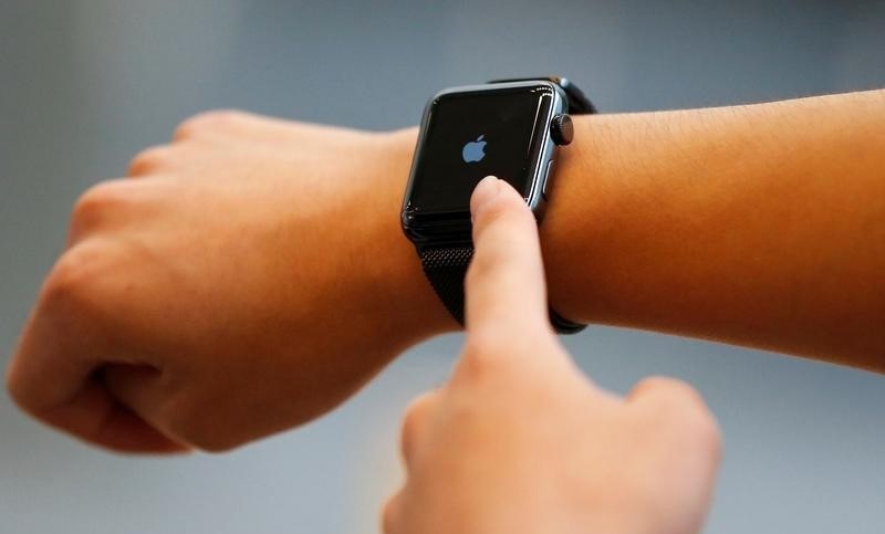 Daiki Shimizu tries an Apple Watch Series 2 after it went on sale at the Apple Store at Tokyo's Omotesando shopping district, Japan, September 16, 2016. nREUTERS/Issei Kato