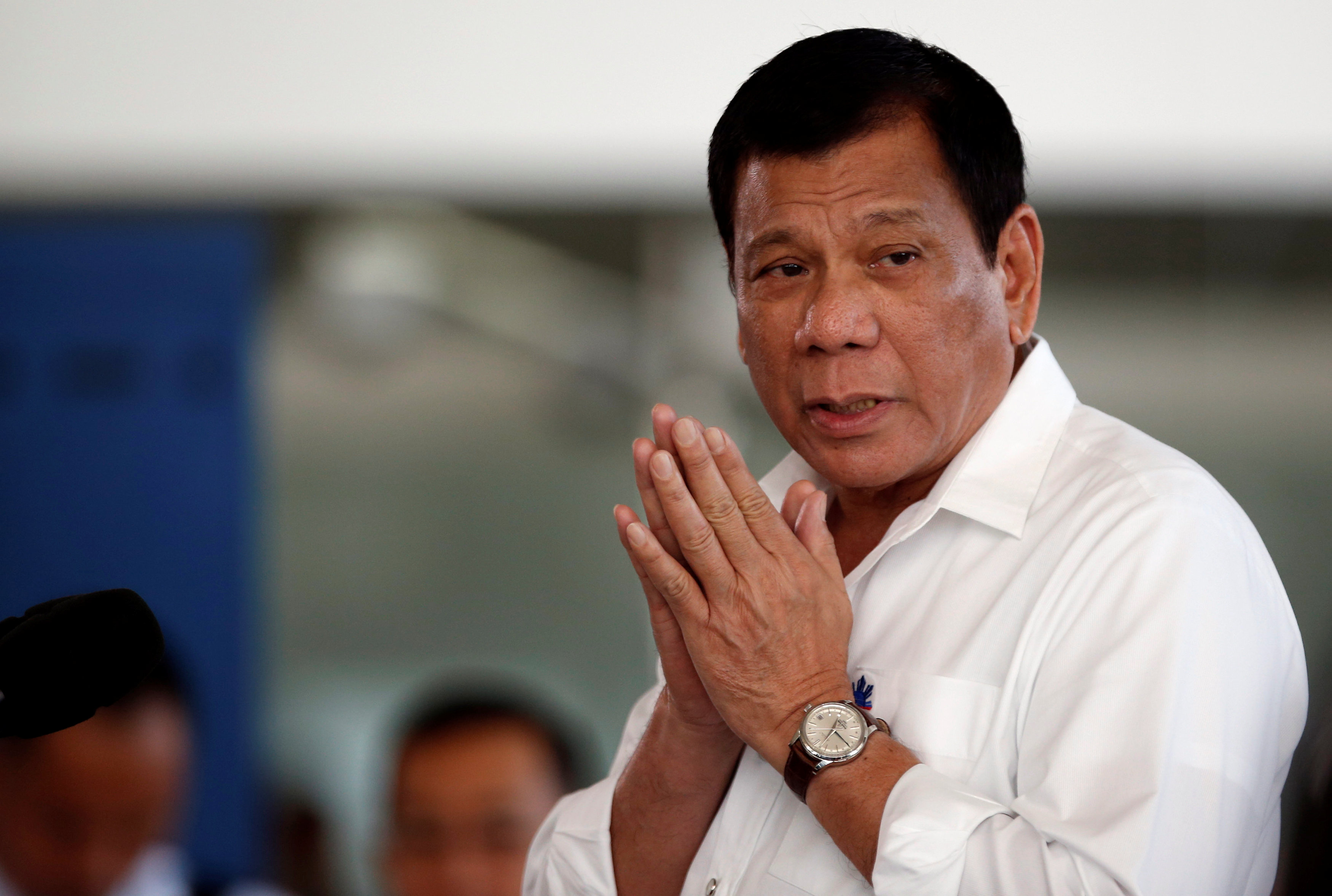 Philippine President Rodrigo Duterte speaks during a news conference before he departs for a visit to Thailand and Malaysia at the Ninoy Aquino International airport in Paranaque, Metro Manila in the Philippines, November 9, 2016. REUTERS/Erik De Castron