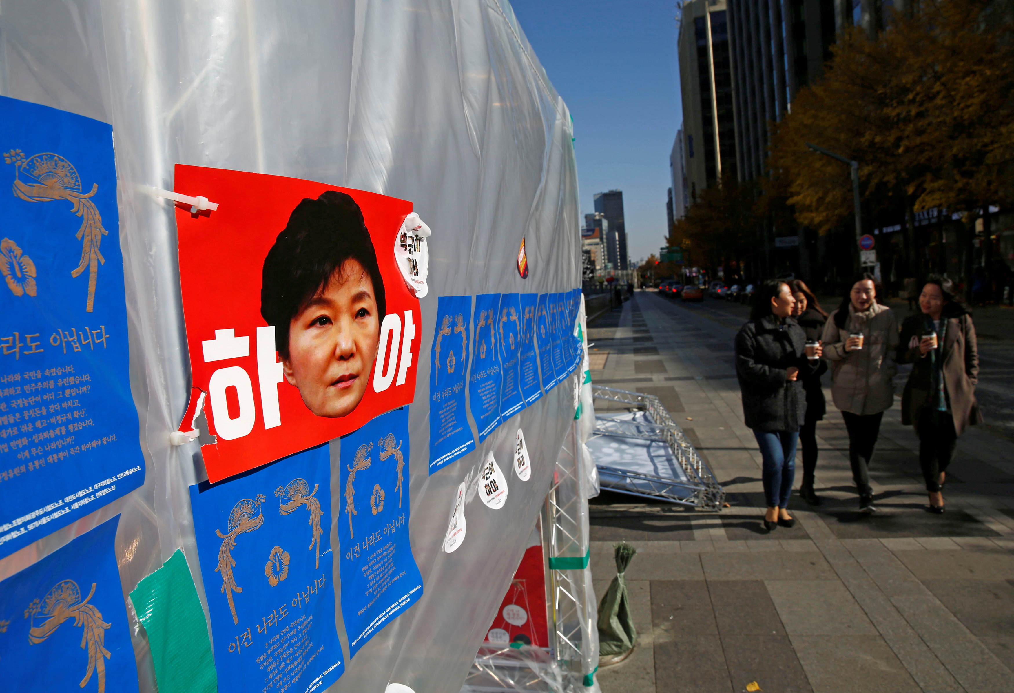 Posters demanding the resignation of South Korean President Park Geun-hye are seen on protesters' tents in central Seoul, South Korea , November 15, 2016. REUTERS/Kim Kyung-Hoonn