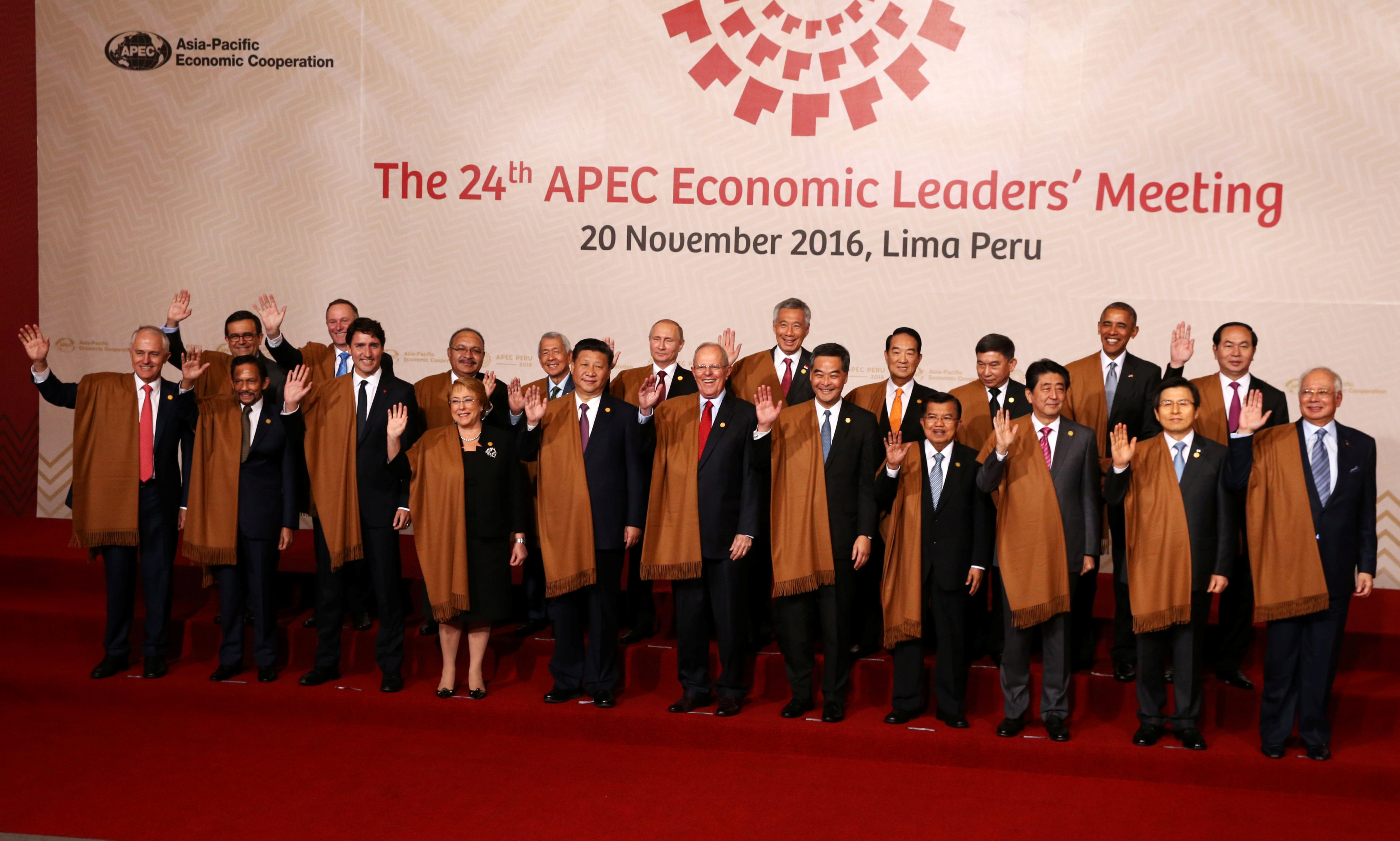 (From L-R, lower row) Australia's Prime Minister Malcolm Turnbull, Brunei's Sultan Hassanal Bolkiah, Canada's Prime Minister Justin Trudeau, Chile's President Michelle Bachelet, China's President Xi Jinping, Peru's President Pedro Pablo Kuczynski, Hong Ko