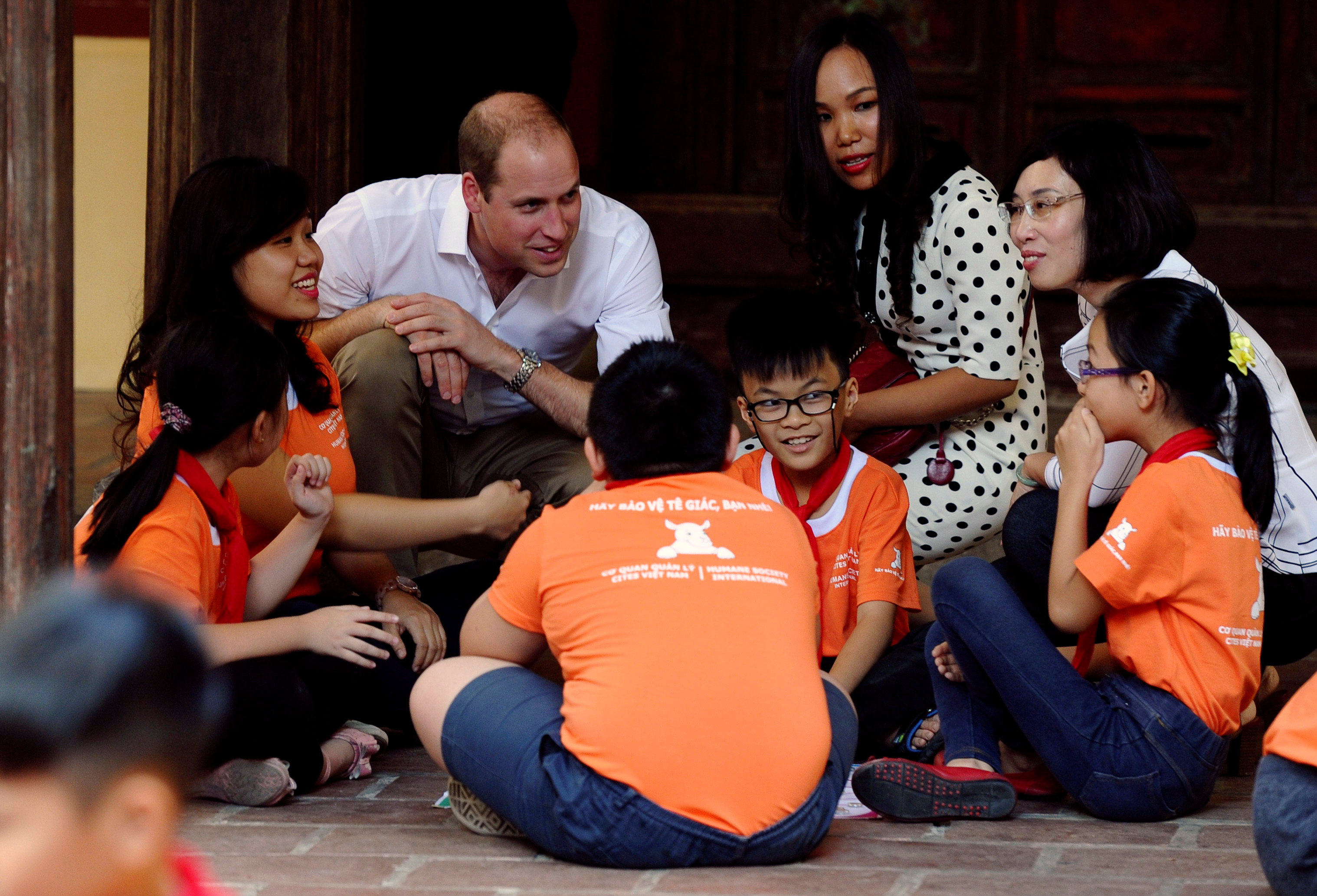 Britain's Prince William talks with pupils as he visits a local primary school in downtown Hanoi, Vietnam November 16, 2016. u00e2u20acu2022 Reuters pic