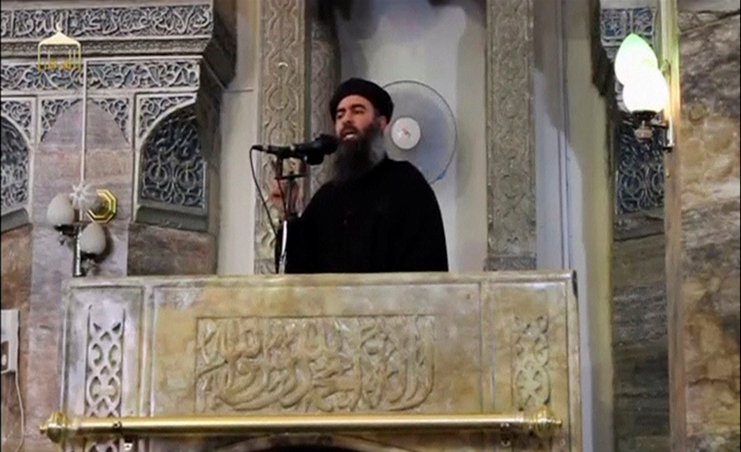 A man purported to be the reclusive leader of the militant Islamic State Abu Bakr al-Baghdadi making what would have been his first public appearance, at a mosque in the centre of Iraq's second city, Mosul, according to a video recording posted on the Int