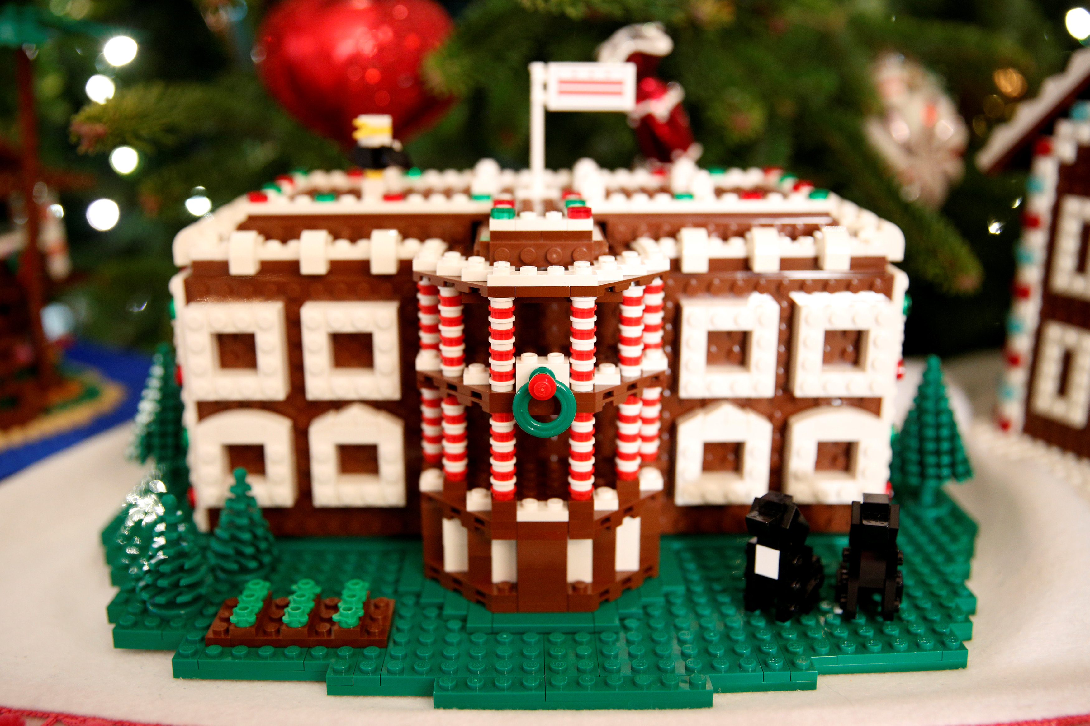 The Lego gingerbread White House is seen in the State Dining Room during a holiday decor preview at the White House in Washington, U.S., November 29, 2016. REUTERS/Kevin Lamarquen