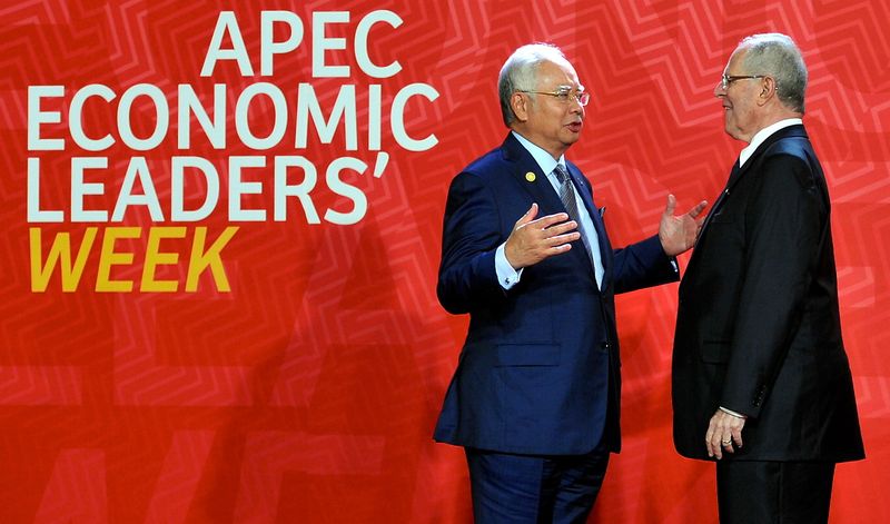 Prime Minister Datuk Seri Najib Razak speaking to the President of Peru, Pedro Pablo Kuczynski as the host of the Summit of the Asia Pacific Economic Cooperation (APEC) at the Lima Convention Centre, November 20, 2016. u00e2u20acu2022 Bernama pic