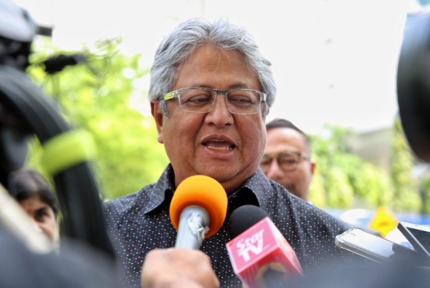 Zaid Ibrahim speaks to reporters outside the Bukit Aman Police Headquarters on November 16, 2016. u00e2u20acu201d Picture by Saw Siow Feng