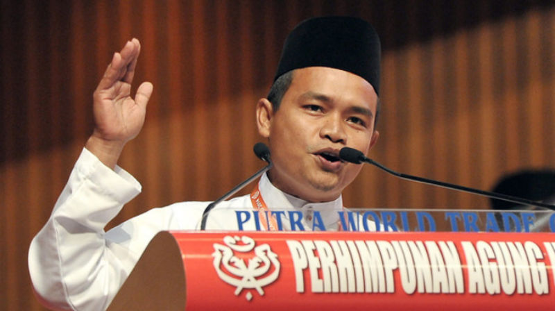 nKUALA LUMPUR, 28 Nov -- Perwakilan Terengganu, Mohd Iskandar Jaafar ketika membahaskan usul pada Perhimpunan Agung Umno Ke-68 yang memasuki hari kedua hari ini, di Pusat Dagangan Dunia Putra (PWTC) di sini, hari ini.n--fotoBERNAMA (2014) HAKCIPTA TERPELI