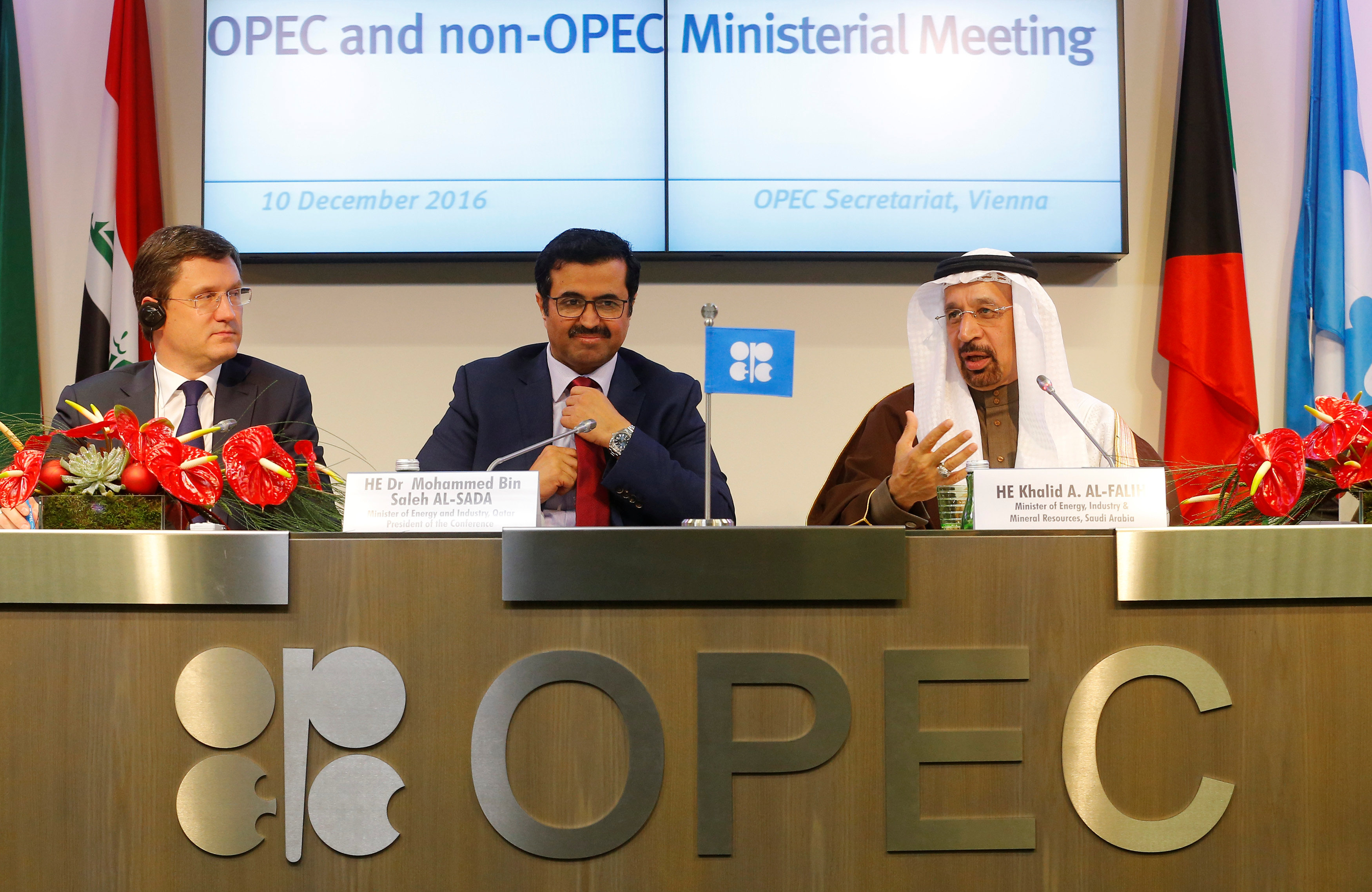 (L-R) Russia's Energy Minister Alexander Novak, OPEC President and Qatar's Energy Minister Mohammed al-Sada and Saudi Arabia's Energy Minister Khalid al-Falih address a news conference after a meeting of the Organization of the Petroleum Exporting Countri