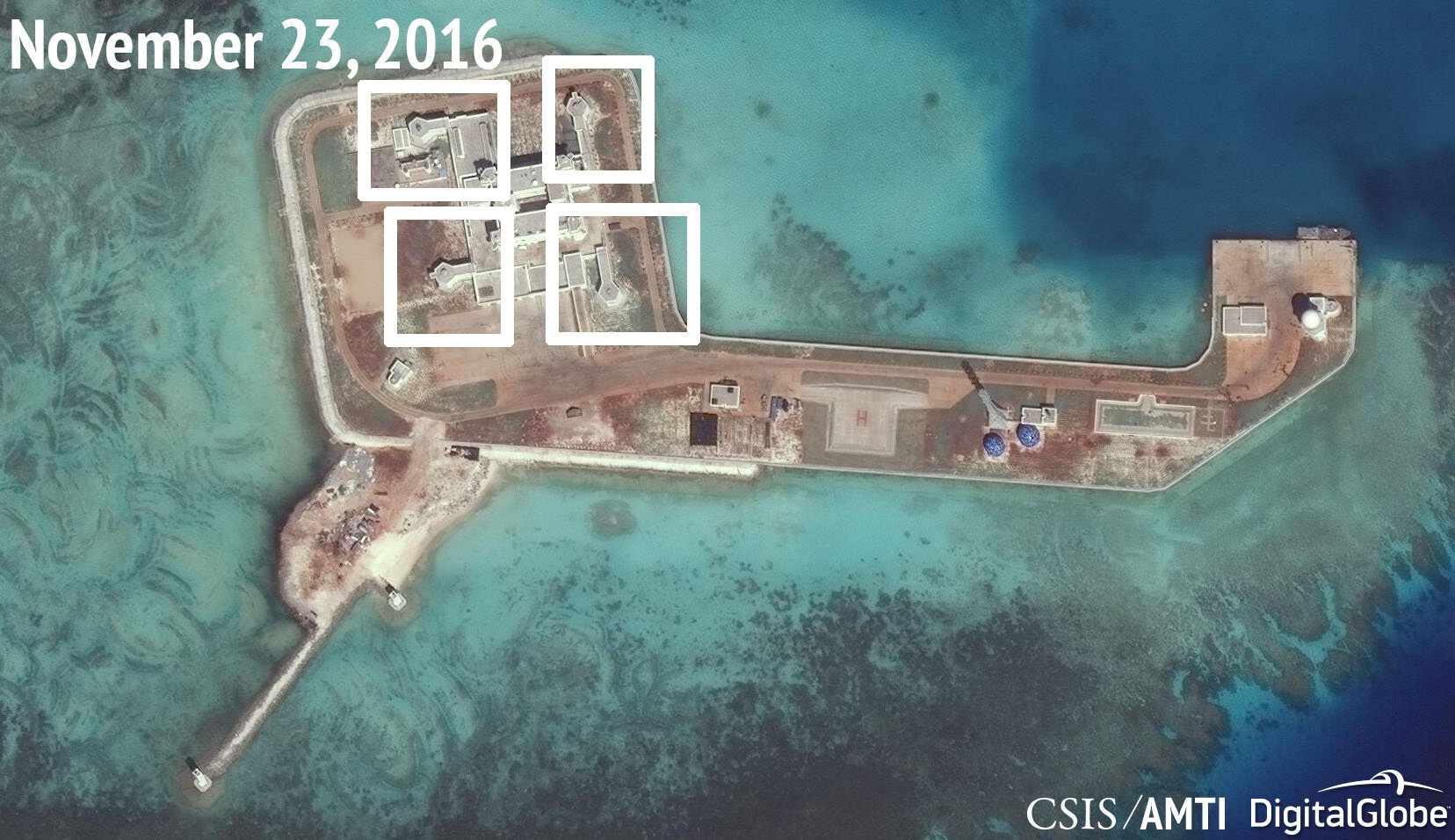 A satellite image shows what CSIS Asia Maritime Transparency Initiative says appears to be anti-aircraft guns and what are likely to be close-in weapons systems (CIWS) on the artificial island Hughes Reef in the South China Sea in this image released on D