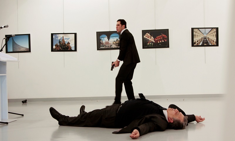 REFILE ADDITIONAL CAPTION INFO ATTENTION EDITORS - VISUAL COVERAGE OF SCENES OF DEATH Russian Ambassador to Turkey Andrei Karlov lies on the ground after he was shot by Mevlut Mert Altintas at an art gallery in Ankara, Turkey, December 19, 2016. Hasim Kil