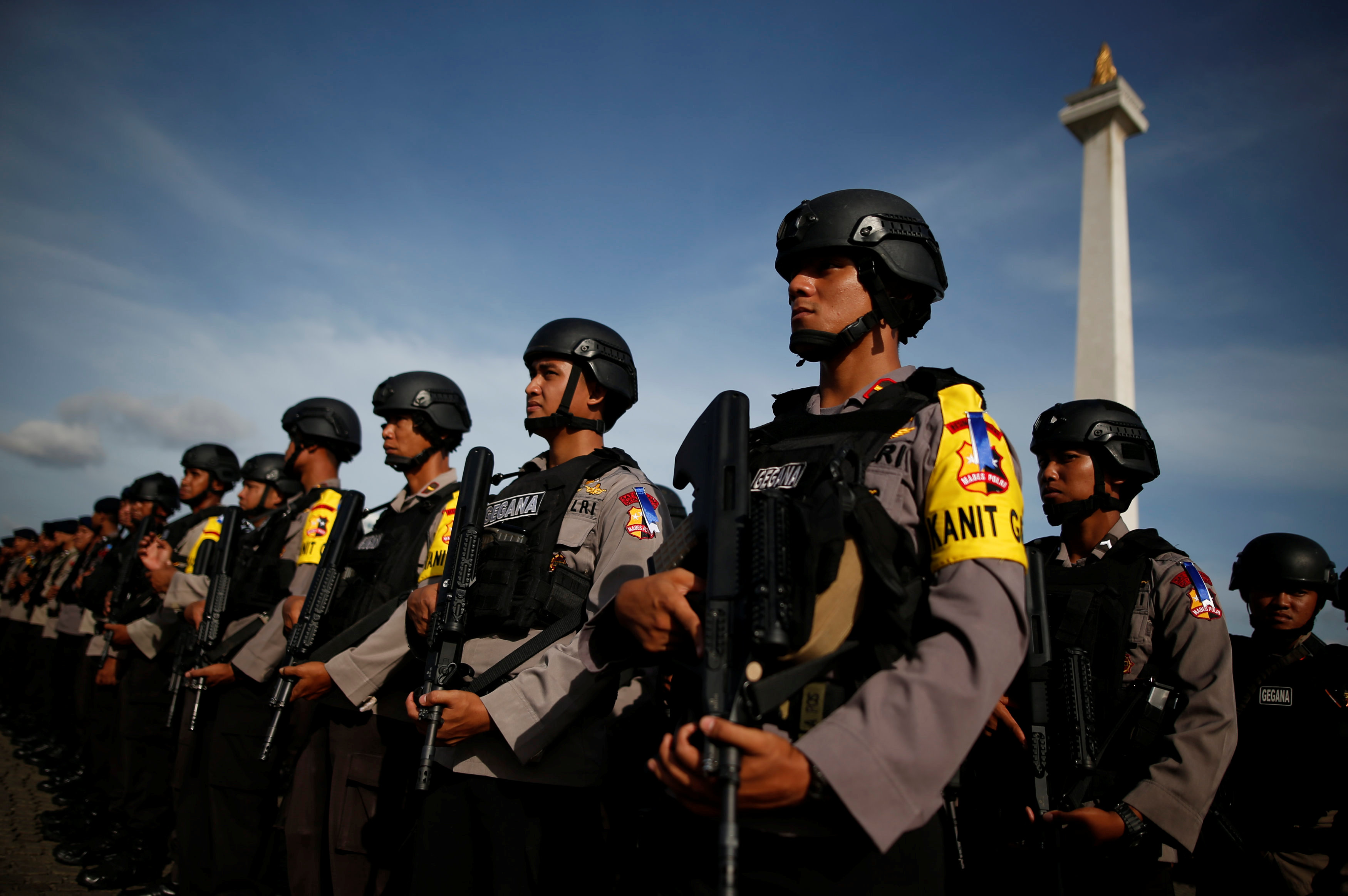 Indonesian police attend a security briefing at the National Monument before deployment during the Christmas and New Year holidays in Jakarta, Indonesia December 22, 2016.REUTERS/Darren Whitesiden