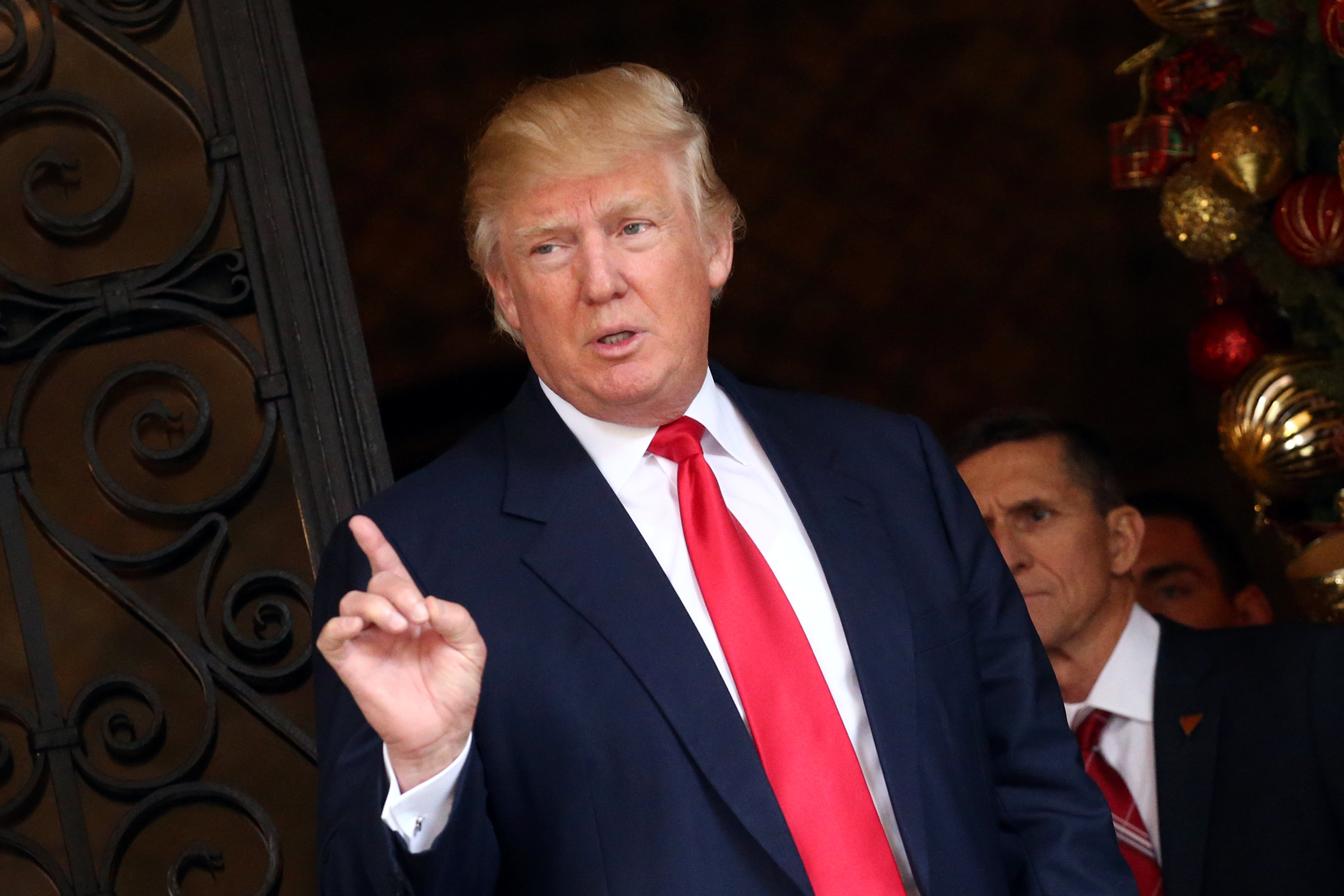 U.S. President-elect Donald Trump talks to members of the media at Mar-a-Lago estate in Palm Beach, Florida, U.S., December 21, 2016. REUTERS/Carlos Barrian