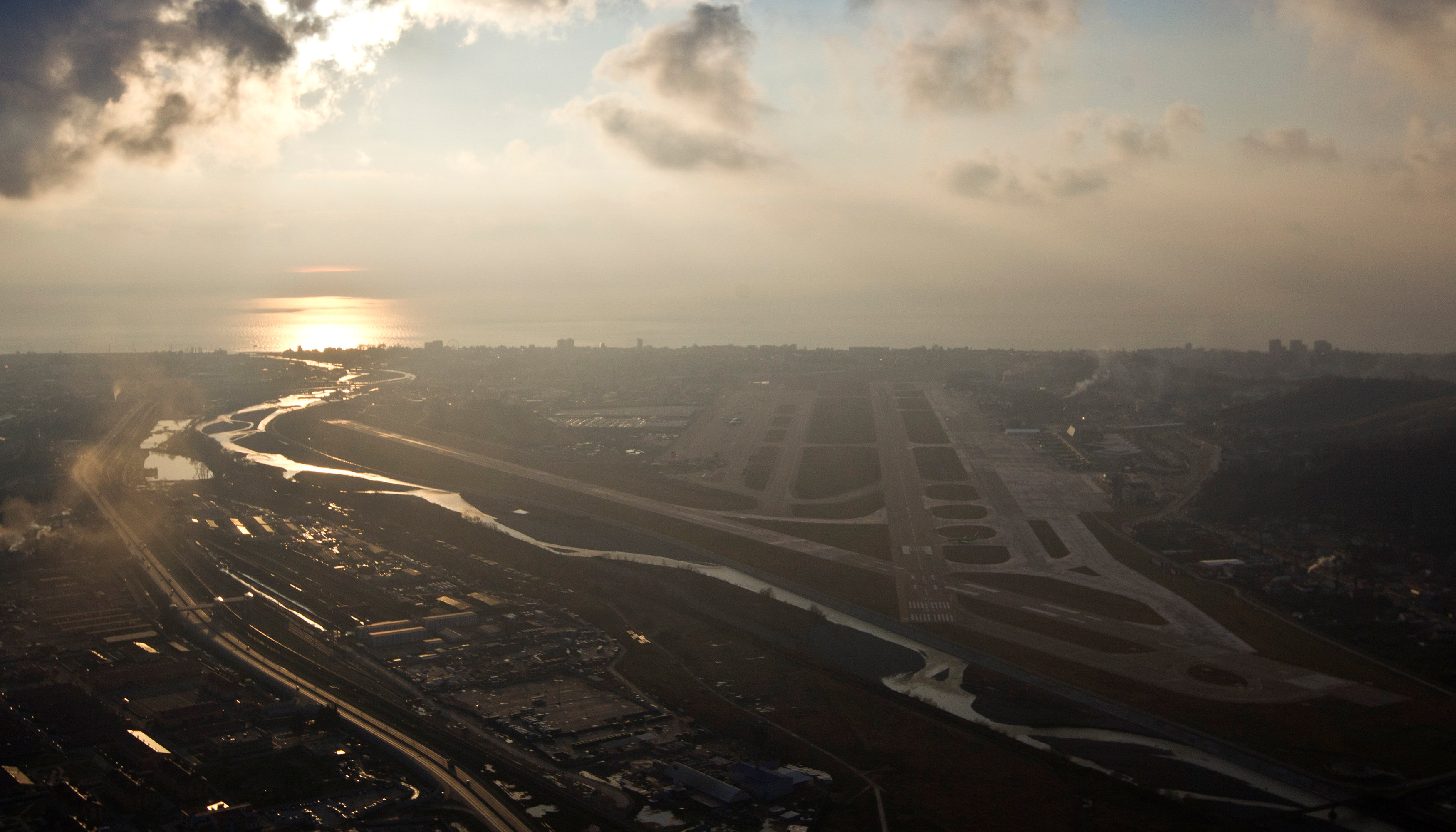 FILE PHOTO: An aerial view from a helicopter shows runways of the Sochi International Airport (Sochi-Adler Airport) in the Black Sea resort city of Sochi, Russia December 23, 2013. REUTERS/Maxim Shemetov/File Photon