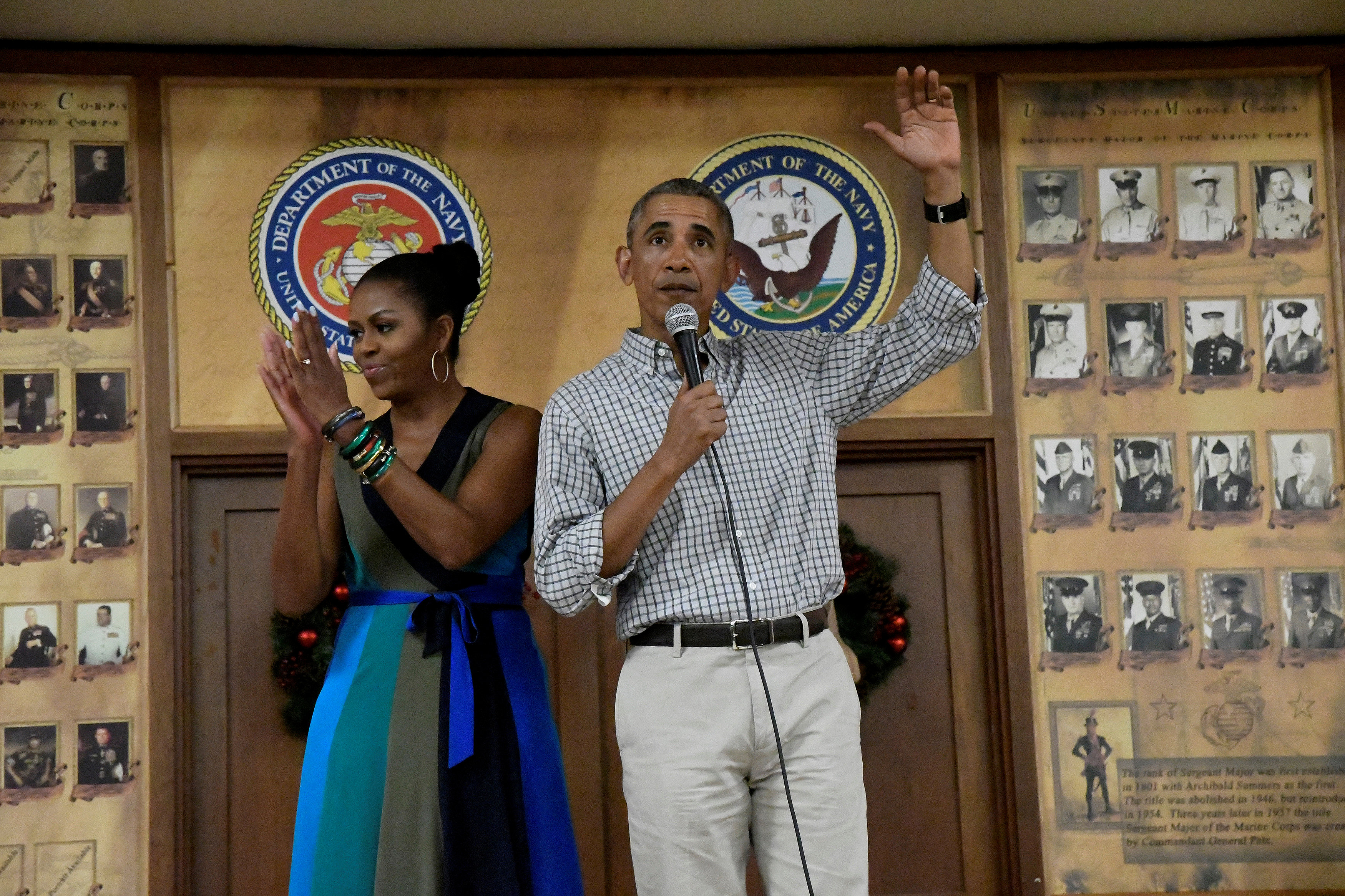 U.S. President Barack Obama waves goodbye after he and First Lady Michelle Obama spoke to U.S. Marines and personnel on Christmas day at Marine Corps Base Hawaii during his Christmas holiday vacation in Kailua, Hawaii, December 25, 2016. REUTERS/Hugh Gent