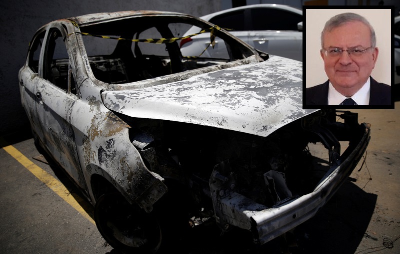 A burned car in which a body was found during searches for the Greek Ambassador for Brazil Kyriakos Amiridis, is pictured at a police station in Belford Roxo, Brazil December 30, 2016. REUTERS/Ricardo Moraes