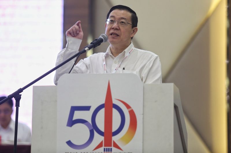 DAP secretary-general Lim Guan Eng speaking at the DAP National Conference 2016 in Shah Alam, December 4, 2016. u00e2u20acu201d Picture by Saw Siow Feng