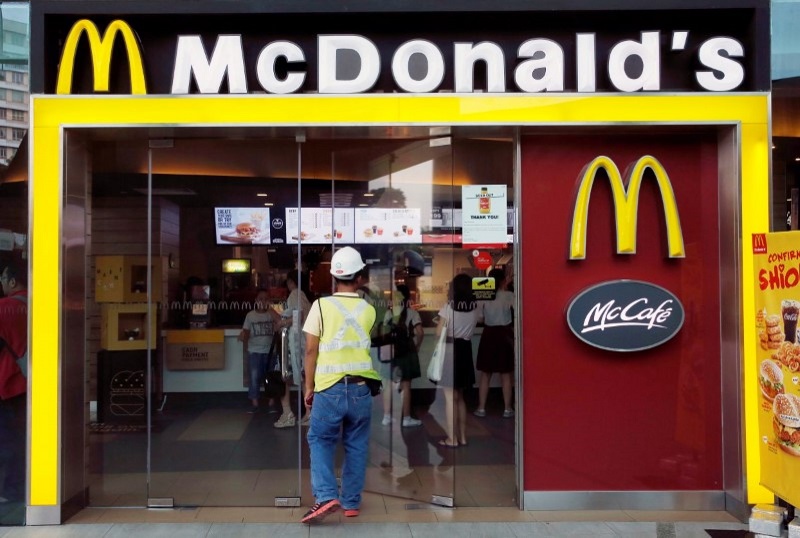 A man enters a McDonald's restaurant in Singapore. Photo: Reuters