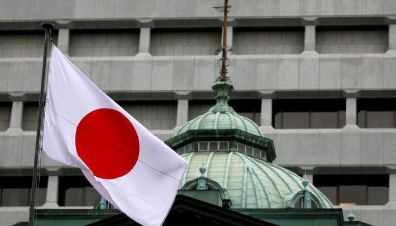 nA Japanese flag flutters atop the Bank of Japan building in Tokyo, Japan, September 21, 2016. REUTERS/Toru Hanai/File Photon