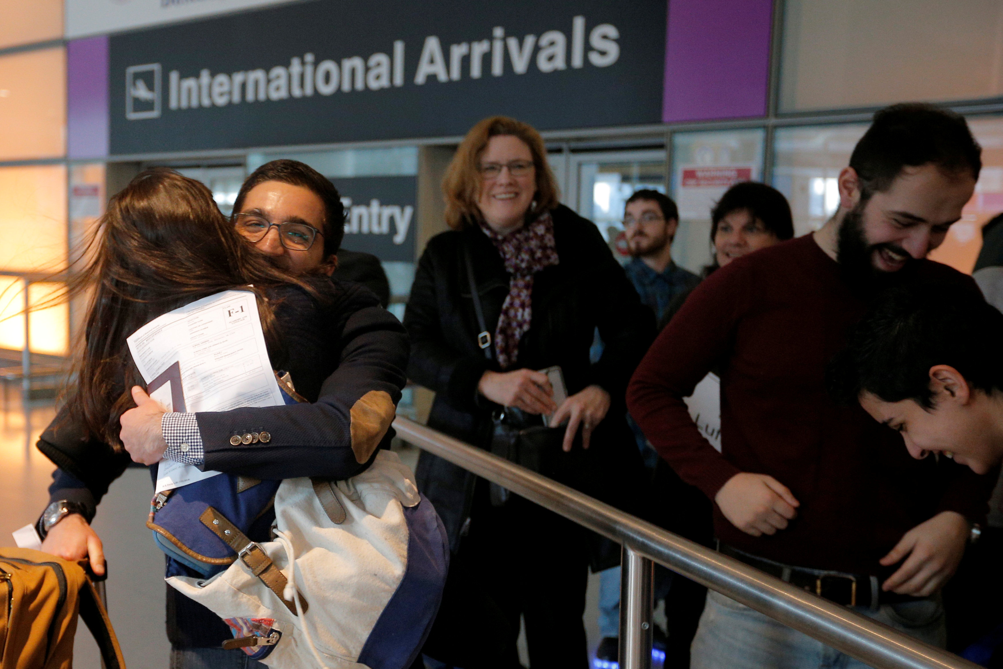 Behnamu00c2u00a0Partopour, a Worcester Polytechnic Institute student from Iran, is greeted by his sister Bahar at Logan Airport after he cleared US customs and immigration on an F1 student visa in Boston February 3, 2017.u00c2u00a0u00e2u20acu201d Reuters pic