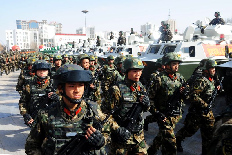 Paramilitary policemen stand in formation as they take part in an anti-terrorism oath-taking rally, in Kashgar, Xinjiang Uighur Autonomous Region February 27, 2017. u00e2u20acu201d Reuters pic