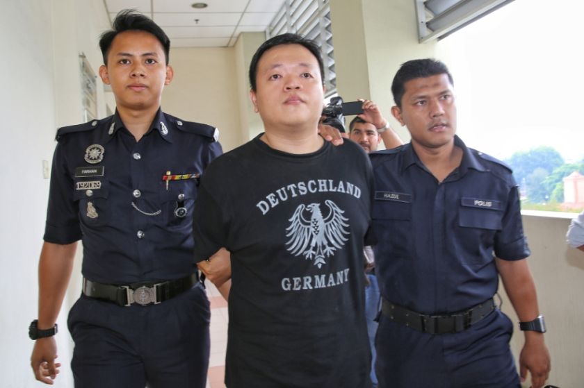 Lam Chang Nam, 31, pleaded not guilty to the alleged offence of extorting RM30,000 from Jonathan Koh for the release of abducted Pastor Raymond Koh. u00e2u20acu201dPicture by Saw Siow Feng