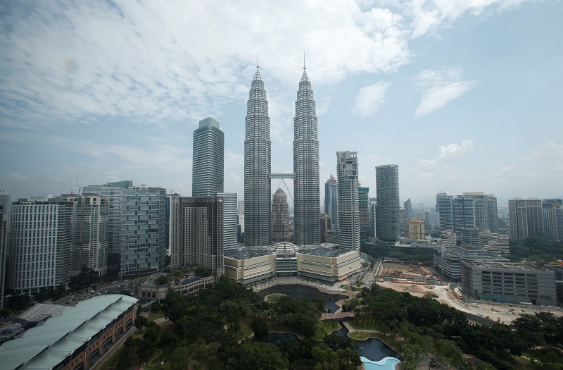 A view of Malaysiau00e2u20acu2122s landmark Petronas Twin Towers in Kuala Lumpur June 27, 2013. u00e2u20acu201d Reuters pic