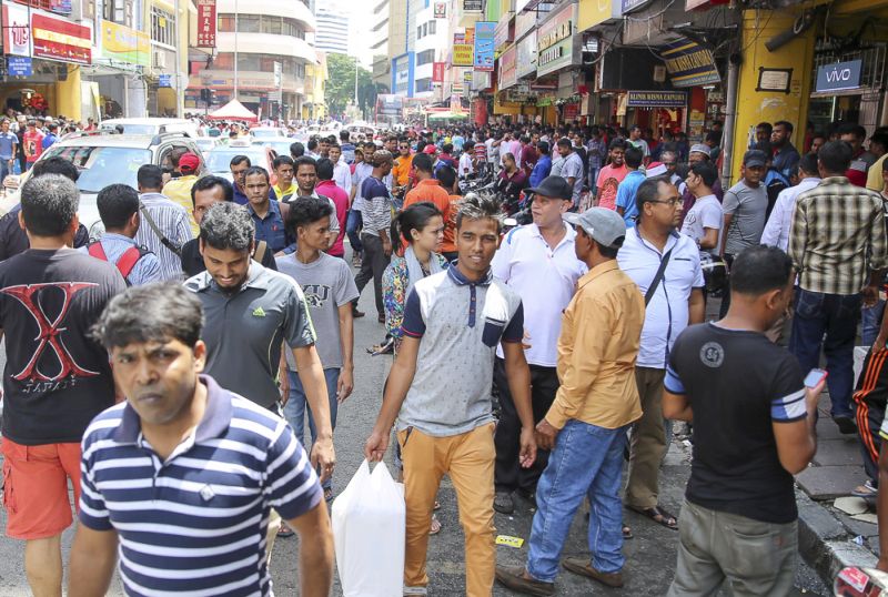 Foreign workers throng Kotaraya, Kuala Lumpur during the Raya holidays on June 26, 2017. u00e2u20acu201d Picture by Choo Choy Maynn