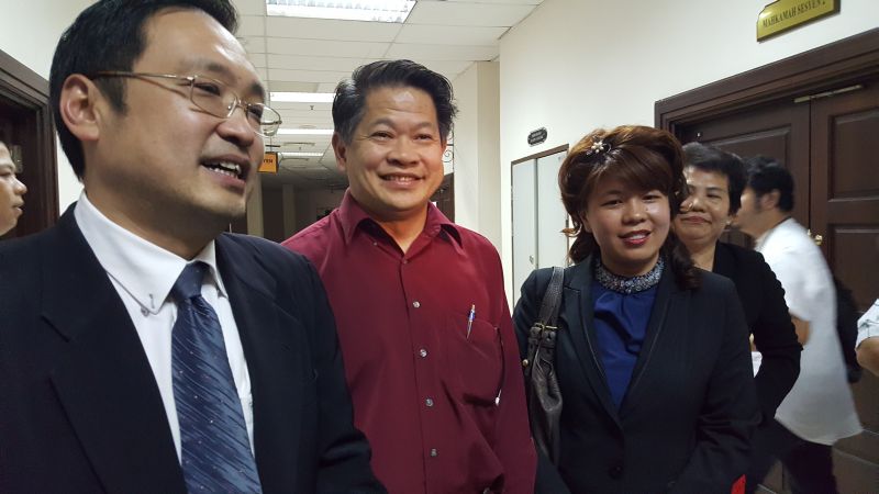 DAP's Dr Ting Tiong Choon (in red) is all smiles after the High Court has ruled that the Sarawak state legislative assembly is not a competent forum to disqualify him as the member for Pujut. u00e2u20acu2022 Picture by Sulok Tawie