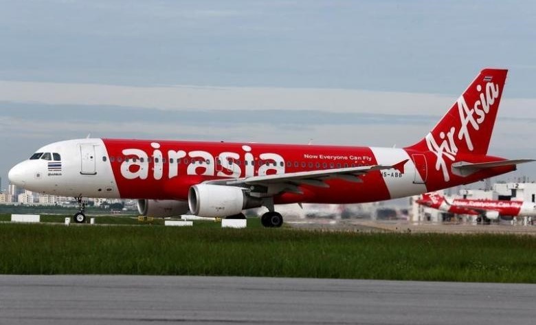 An Air Asia plane prepares for take off at Don Mueang International Airport in Bangkok, Thailand, June 29, 2016. -REUTERS-