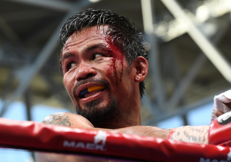 Bloodied Manny Pacquiao of the Philippines is seen during the WBO World Welterweight Title fight with Jeff Horn of Australia in Brisbane July 2, 2017. u00e2u20acu201d Picture by Dave Hunt/AAP via Reuters