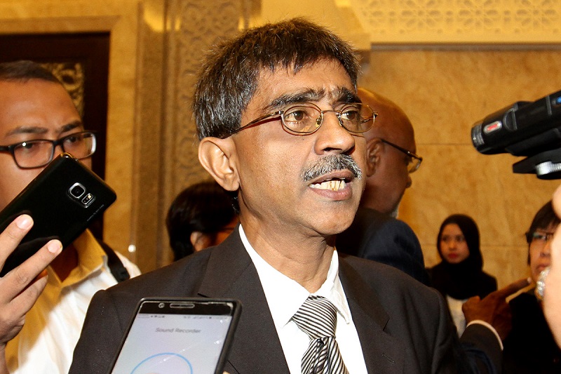 Lawyer Mohamed Haniff Khatri speaks to reporters after the BNM 1990s Forex Losses RCI's opening session at the Court of Appeal in Putrajaya Aug 8, 2017. u00e2u20acu201d Picture by Miera Zulyanan