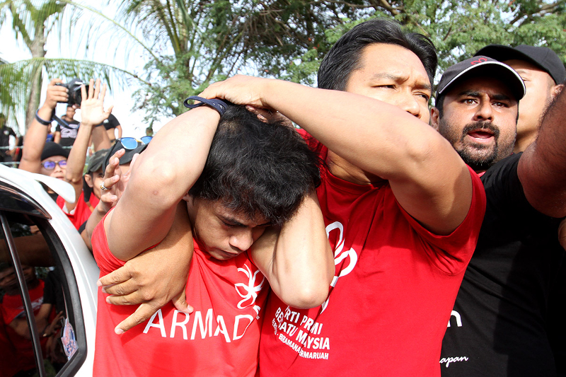 PPBM members were hit during the mass brawl at the Nothing To Hide 2.0 Forum in Shah Alam August 13, 2017. u00e2u20acu201d Picture by Miera Zulyana