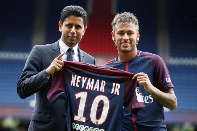 New Paris Saint-Germain signing Neymar Jr and Chairman and CEO Nasser Al-Khelaifi pose with the club shirt in Paris August 4, 2017. u00e2u20acu201d Reuters pic