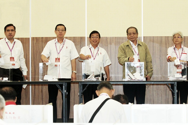 (From left) DAP leaders Anthony Loke, Lim Guan Eng, Tan Kok Wai and Lim Kit Siang cast their votes during the partyu00e2u20acu2122s special congress  in Shah Alam November 12, 2017. u00e2u20acu201d Picture by Miera Zulyana
