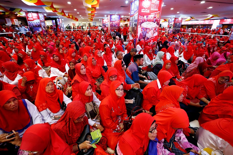 Wanita Umno members listen to a speech by Datuk Seri Najib Razak during the 71st Umno General Assembly in Kuala Lumpur December 7, 2017. u00e2u20acu201d Reuters pic