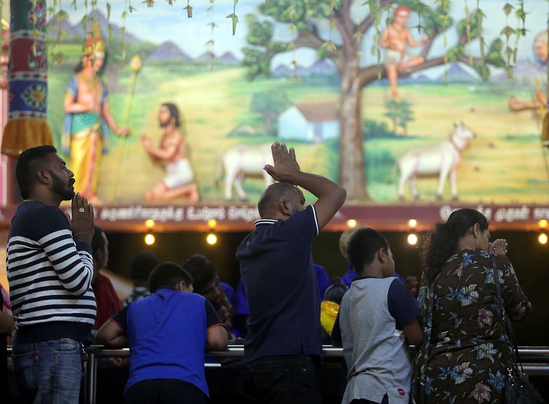 Hindu devotees performing their prayers at the Kallumalai Arulmigu Subramaniyar Temple in Ipoh the day before the Thaipusam festival, January 29, 2018. u00e2u20acu201d Picture by Farhan Najib