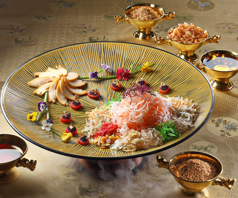 Shangri-La Kuala Lumpur's famed Shang Palace has abalone as its yee sang highlight. 