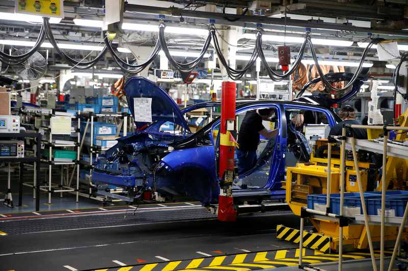 Employees at the assembly line to build Yaris cars at Toyota's automobile manufacturing plant in Onnaing, France January 22, 2018. u00e2u20acu201d Reuters pic