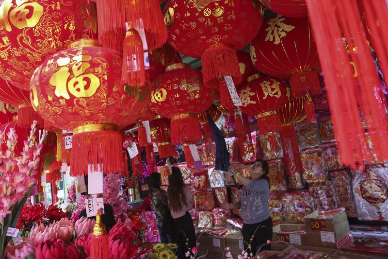 Customers shop for Chinese New Year decorations at a shop in Kuala Lumpur February 7, 2018. u00e2u20acu2022 Picture by Yusof Mat Isa