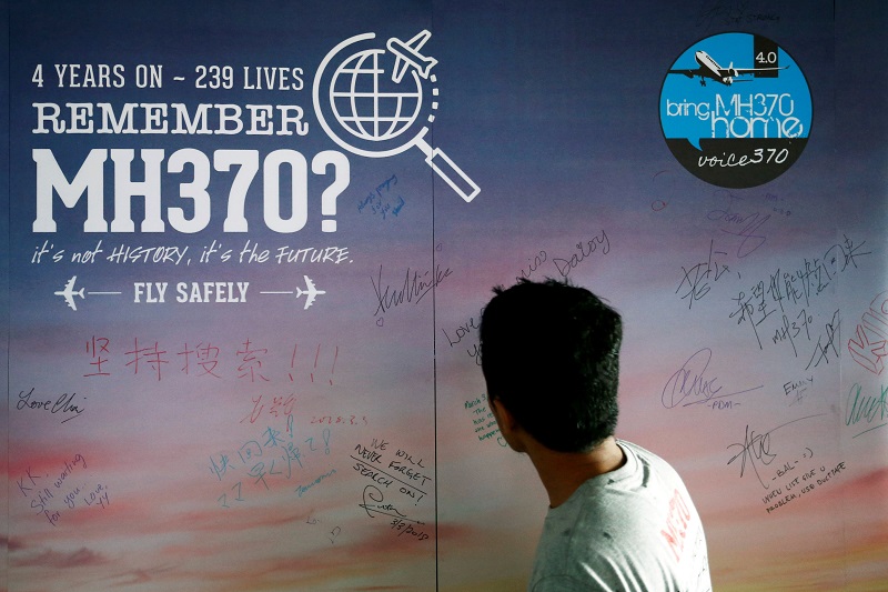 A man looks at a message board for passengers, onboard the missing Malaysia Airlines Flight MH370, during its fourth annual remembrance event in Kuala Lumpur, Malaysia March 3, 2018. u00e2u20acu201d Reuters pic