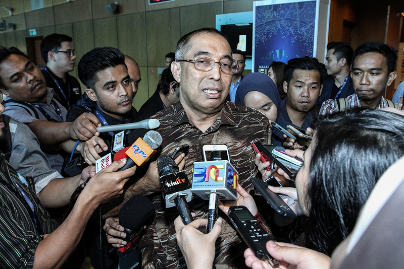 Minister of Communications and Multimedia Malaysia Datuk Seri Salleh Said Keruak speaks to reporters during the launch of the Malaysia Fintech Expo 2018 in Kuala Lumpur March 5, 2018. u00e2u20acu201d Picture by Miera Zulyana 