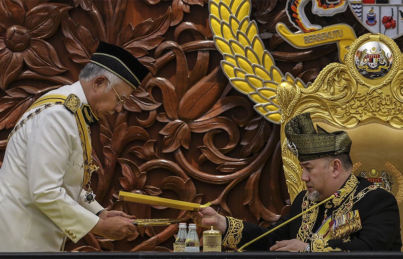 Prime Minister Datuk Seri Najib Razak passes the royal address to Yang di-Pertuan Agong Sultan Muhammad V during the opening of the first meeting of the sixth term of the 13th Parliament in Kuala Lumpur March 5, 2018. u00e2u20acu201d Picture by Azneal Ishak